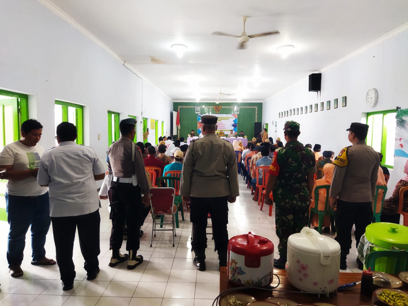 Bhabinkamtibmas Polsek Nguntoronadi Hadiri Pelantikan Perangkat Desa, Dukung Terciptanya Kamtibmas Kondusif