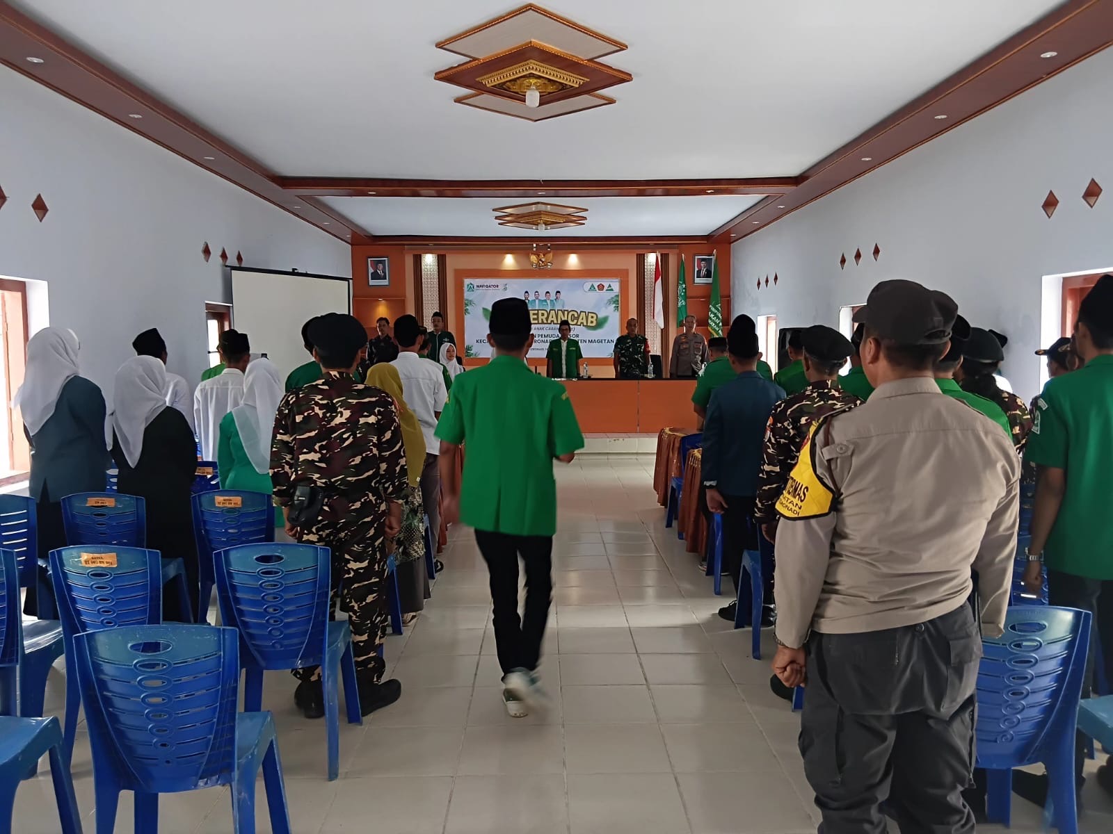 Bhabinkamtibmas Desa Simbatan Hadiri KONFERANCAB V GP Ansor Nguntoronadi, Pastikan Kamtibmas Kondusif