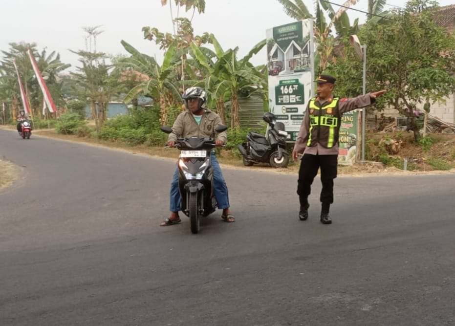 Kapolsek Kartoharjo Pimpin Pengamanan Rawan Pagi dan Pengaturan Lalu Lintas Demi Ciptakan Kamseltibcar Lantas